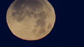 Close up of full Beaver Moon starting partial lunar eclipse in Kent, UK