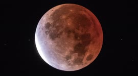 Longest lasting partial lunar eclipse in 580 years glows over New York City