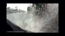 CLOSE CALL: Reckless speeding moped rider almost crashes while it’s raining (Dashcam Video)