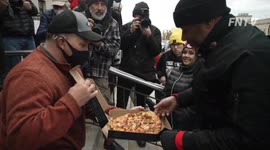 BLM and Rittenhouse supporters share pizza outside Kenosha courthouse