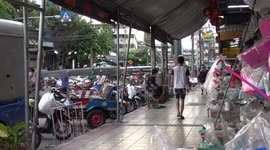 Market vendors selling food in Bangkok, Thailand