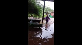 Flash floods bring massive amount of mud into Vietnam's village