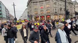 Hundreds join World Wide Demonstration against coronavirus restrictions in Oxford Circus, London