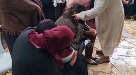 Palestinians carry the body of Isra Ekhzemiya during her funeral at Qabatya village near the West Bank City of Jenin