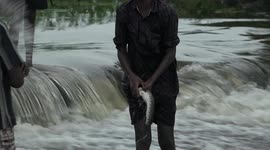 People catch fish,play and take selfie in flood water in Tamilnadu