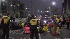 Police arrest dozens of Insulate Britain protesters blocking roads in Vauxhall, London