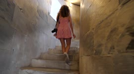 Climbing the stairs of the Tower of Pisa