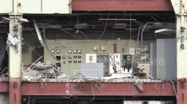 Crews demolish one of the last old coal fired electricity generating plants in Ontario Canada as the province move towards green renewable clean energy