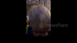 UK: People In London Protest Against Austrian Reintroduction Of COVID Restrictions