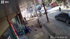 Oil barrel suddenly explodes in Chinese man's face as he attempts to cut it open