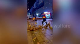 Man pretends to be an 'Airbender' as whirlwind of leaves swirls around him