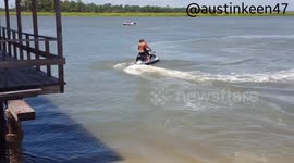 Skimboarder 'steals' jetski in smooth hijacking