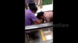 A toddler's horrible escalator accident in China