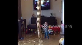 Toy tower crashes on baby