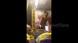 Man leads Dublin night bus passengers in song