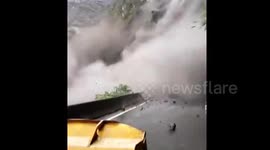 Rainfall causes huge cliff landslide in China