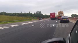 UNDER30 A1 (M) south bound just after A64 exit slip lorry and car collision (car wedged sideways under front of lorry)