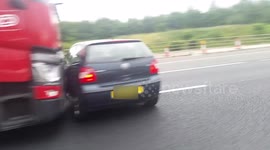 Car wedged in front of lorry on A1 (M) motorway