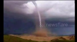Unusual tornado touches down in West China