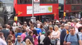 Commuters try to crowd onto buses during Tube strike