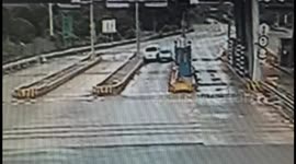 Cars become wedged after collision at toll both