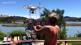 Drone delivers a cocktail to the pool