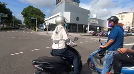 WTF MOMENT: Clueless moped rider almost crashes into oncoming traffic (Dashcam Video)
