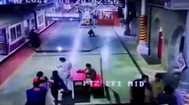 Woman slips from moving train, rescued in western India