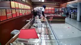 Terrifying moment gunman fires shots while robbing gold shop in Thailand