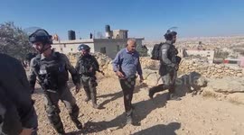 An Israeli bulldozer demolished a Palestinian house located under the pretext of building without a permit