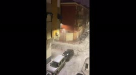 River of hail flows through street in Alicante in Spain