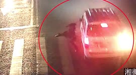 Chinese woman jumps out the way of car speeding through zebra crossing