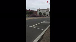 'Multiple riders, traveling in tight formation, go down like dominoes during race'