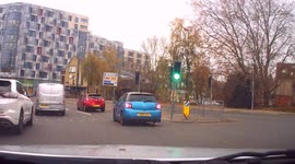 DASHCAM FOOTAGE - Large Transporter Truck drives straight through RED light at major crossroads!