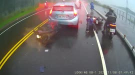 ACCIDENT / FAIL: Speeding moped rider drives through massive puddle causing other riders to crash (Dashcam Video)