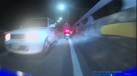 RECKLESS DRIVING: Driver cruises through motorcycle lane head-on towards oncoming traffic (Dashcam Video)