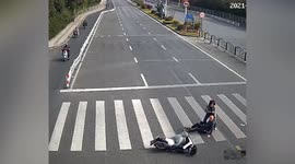 Riders knocked over by speeding scooter in eastern China
