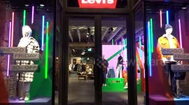 Shops in central London prepare for Black Friday with offers and Xmas lights