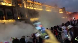 Mexico: SSP Police Deploy Smoke Flares To Fend Off Demonstrators At Zócalo During 25N March In Mexico City