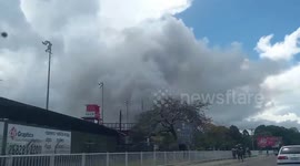 Huge cloud of smoke rises on third day of riots and fires in Honiara, Solomon Islands