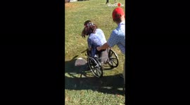 'Baseball player running bases in a wheelchair face plants on ground *EPIC FAIL* 
'