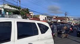 Hero cop saves cat stuck in car engine in Indonesia