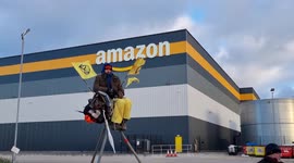 Extinction Rebellion (XR) activists block Amazon depots across the UK during Black Friday