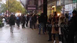 Queues grow outside John Lewis as Black Friday shoppers hit Oxford Street