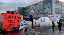 Extinction Rebellion (XR) activists block Amazon depots across the UK during Black Friday