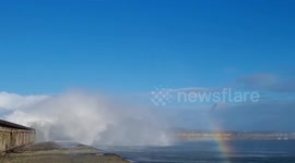Crashing waves and stunning rainbow as Storm Arwen strikes Anglesey