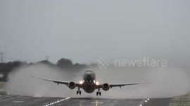 Planes skid from side to side as they land at a snowy Birmingham Airport during Storm Arwen