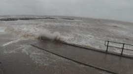 Storm Arwen waves breaking on the defences at Cleethorpes
