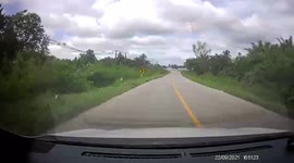 Driver with quick reaction dodges turning truck in Thailand