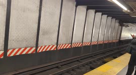 New York City Subway car entering subway station with sound